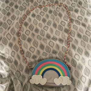 Claire’s holographic, rainbow back